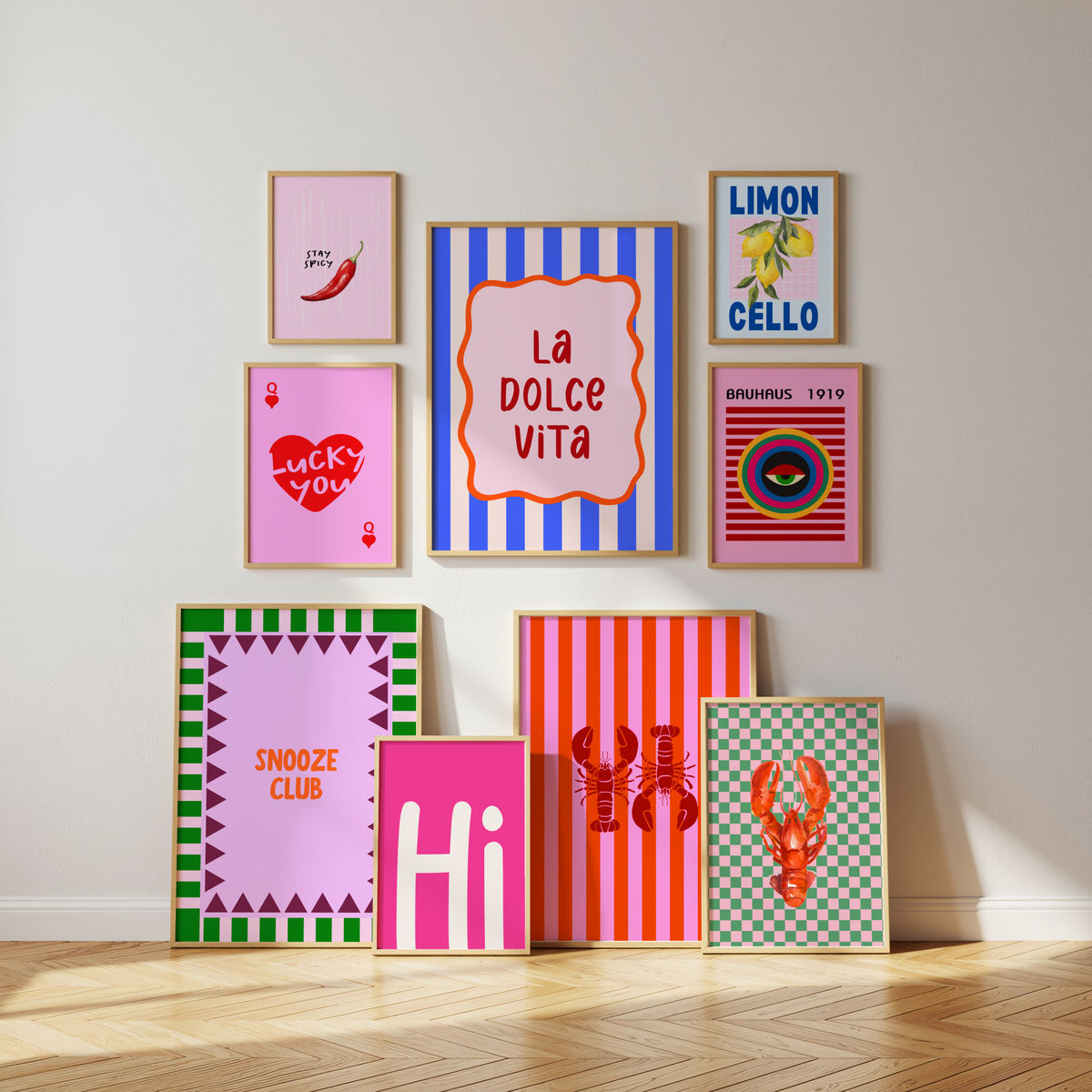 Colourful gallery wall with framed budget posters and graphic art prints by Kzara Visual