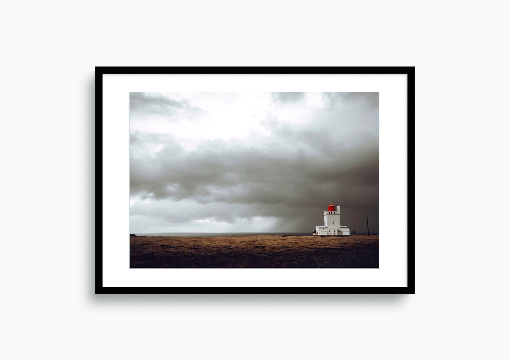 Mysterious lighthouse in Dyrholaey, Iceland  under dramatic stormy skies #18