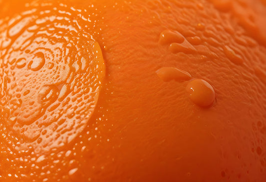 Close-up view of a fresh orange with droplets of water on its surface, showcasing its vibrant color and texture. Generative AI