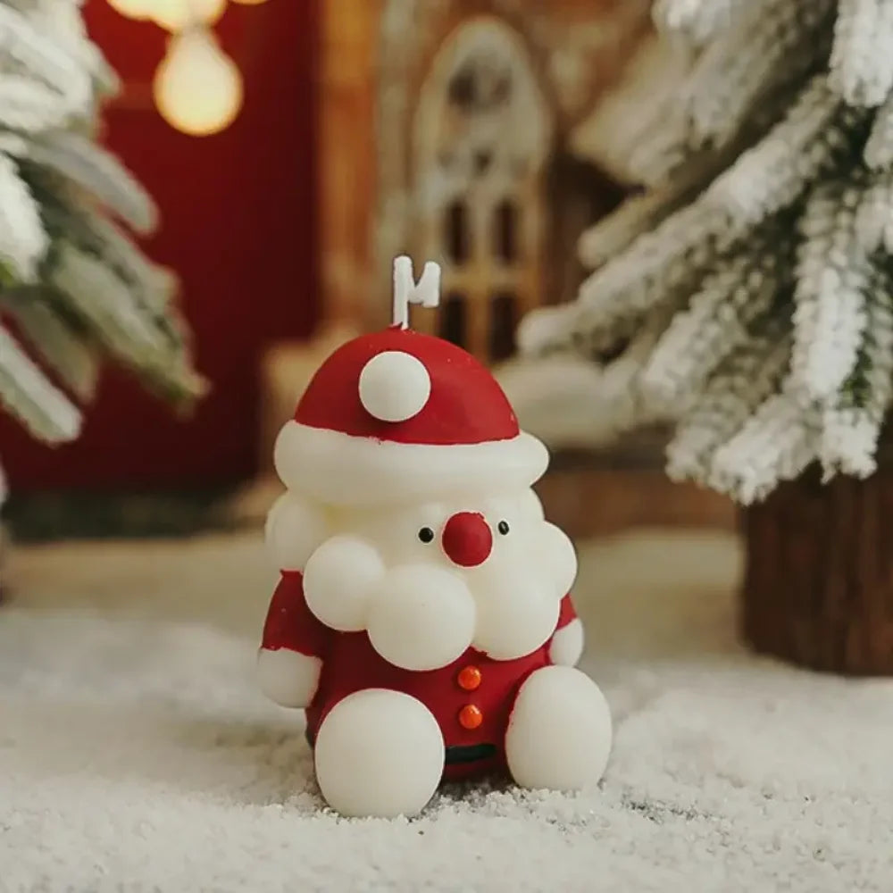 Small Santa Claus figurine with a red hat and white body, set against a blurred Christmas scene.