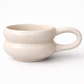 White ceramic mug on a white background