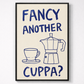 Framed poster with text 'Fancy Another Cuppa?' and a coffee cup and Moka pot illustration on a beige background.