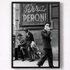 Framed black and white photo of people on a street with a Peroni sign.