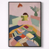 Framed artwork of a person reading a book on a colorful couch with books scattered around.