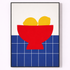 Framed artwork of a red bowl with yellow lemons on a blue grid background
