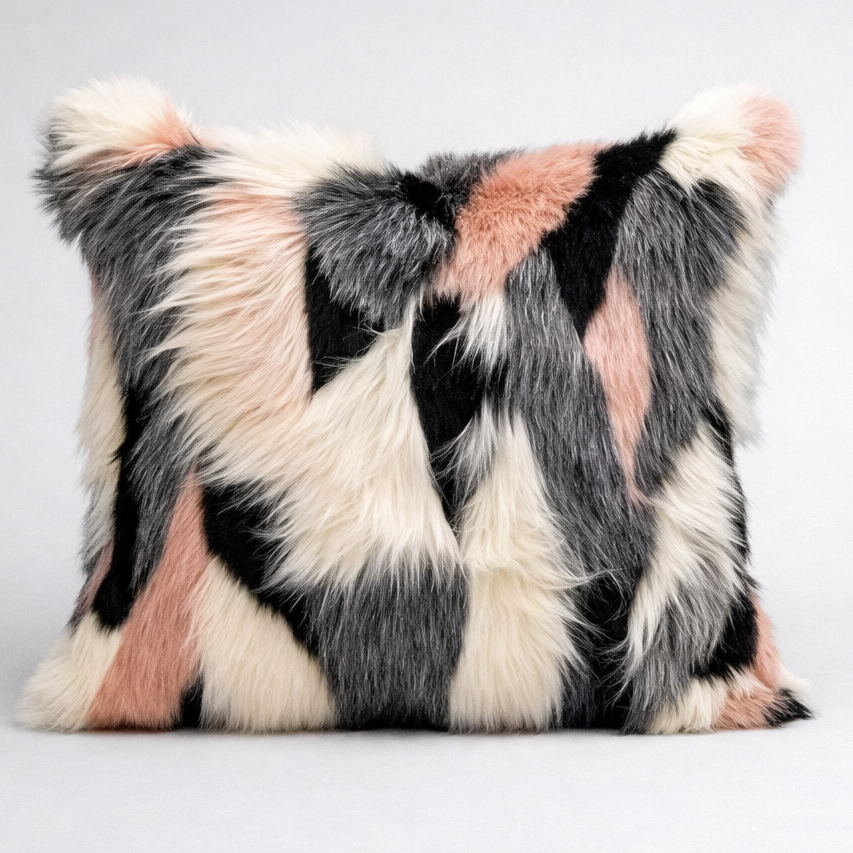 Multicolored fur pillow on a light gray background