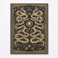 Decorative wall art with snake pattern on a black background