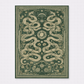 Decorative green and gold patterned rug with snake design on a white background