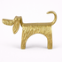 Gold dog-shaped object on a white background