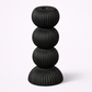 Black decorative item with dimensions labeled on a white background