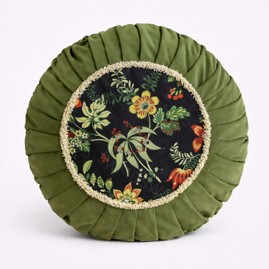 One round floral-patterned cushion on a white background