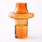 Orange glass vase with dimensions on a white background