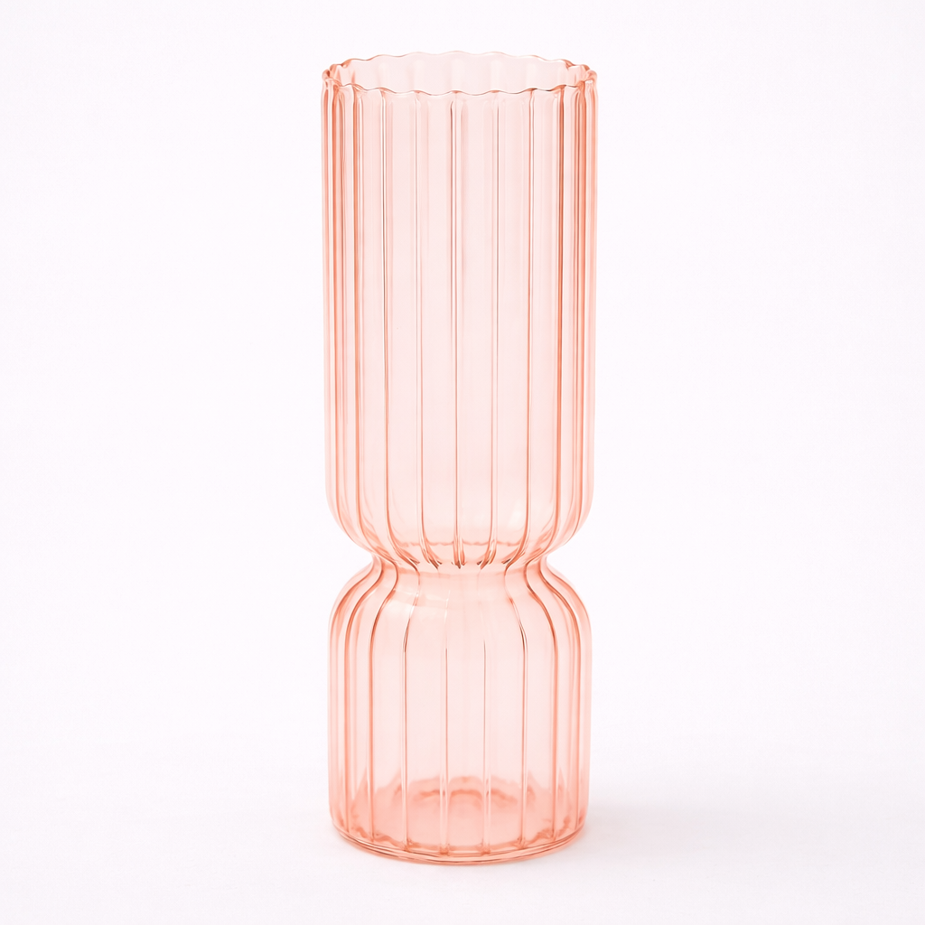 Pink glass vase with measurements on a white background