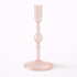 Clear glass hourglass on a white background