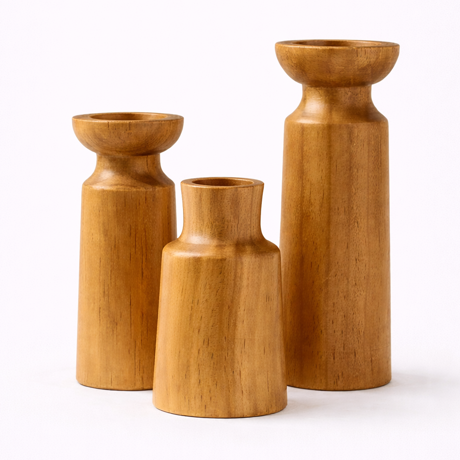Three wooden vases of different sizes on a white background