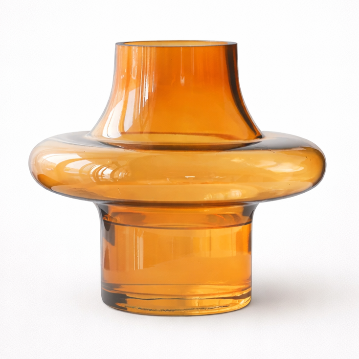Amber glass vase on a white background