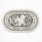 Round coaster with floral design and text on a white background
