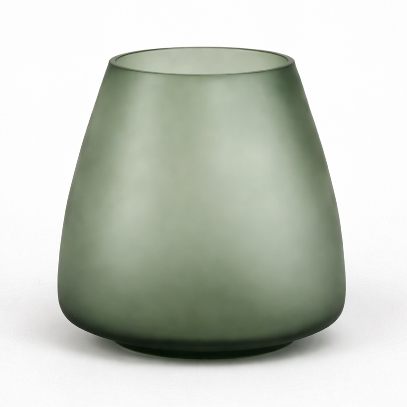 Green glass vase on a white background