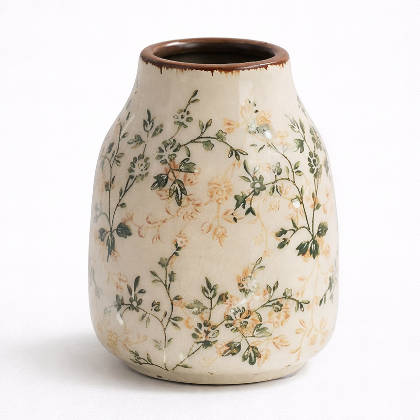 Ceramic vase with floral pattern on a white background