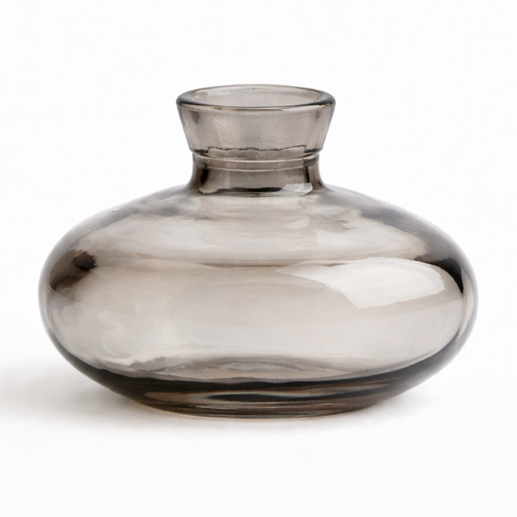 Smoky gray glass vase on a white background