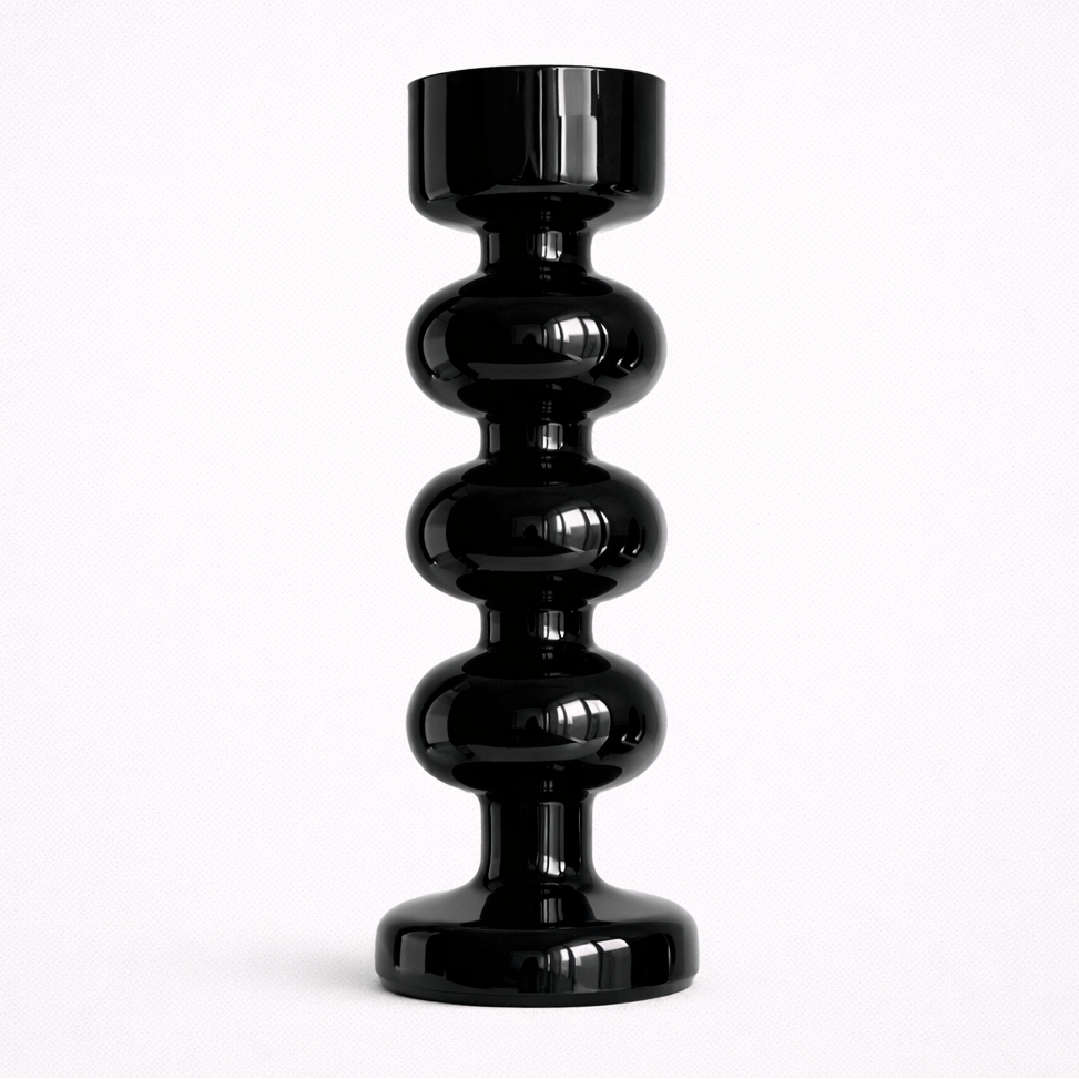 Black glass candle holder on a white background