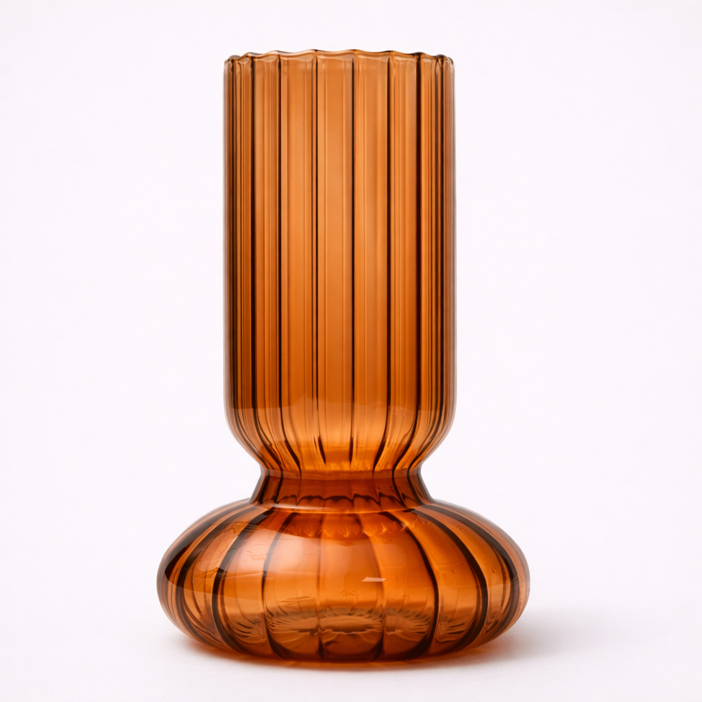 Brown glass vase with ribbed texture on a white background