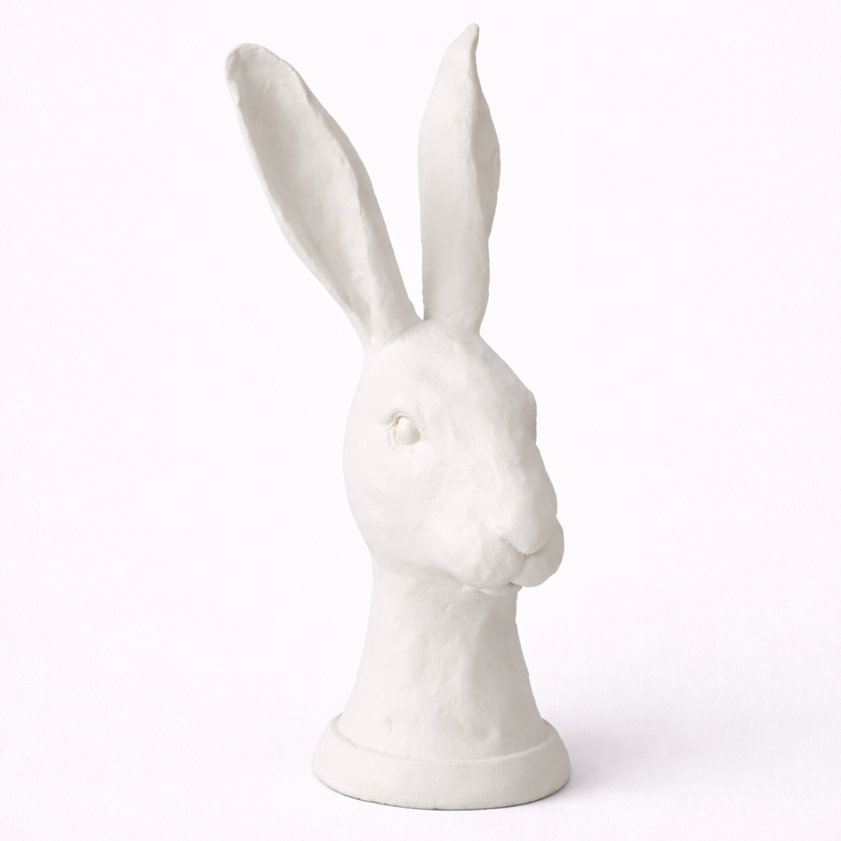 White rabbit sculpture on a white background