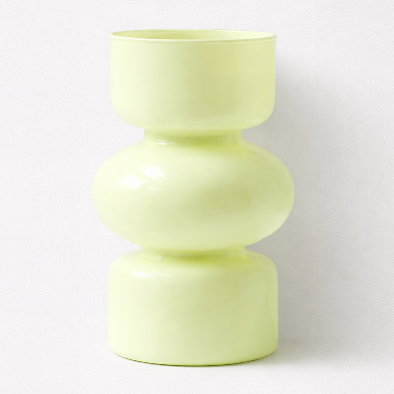 Light green ceramic vase on a white background