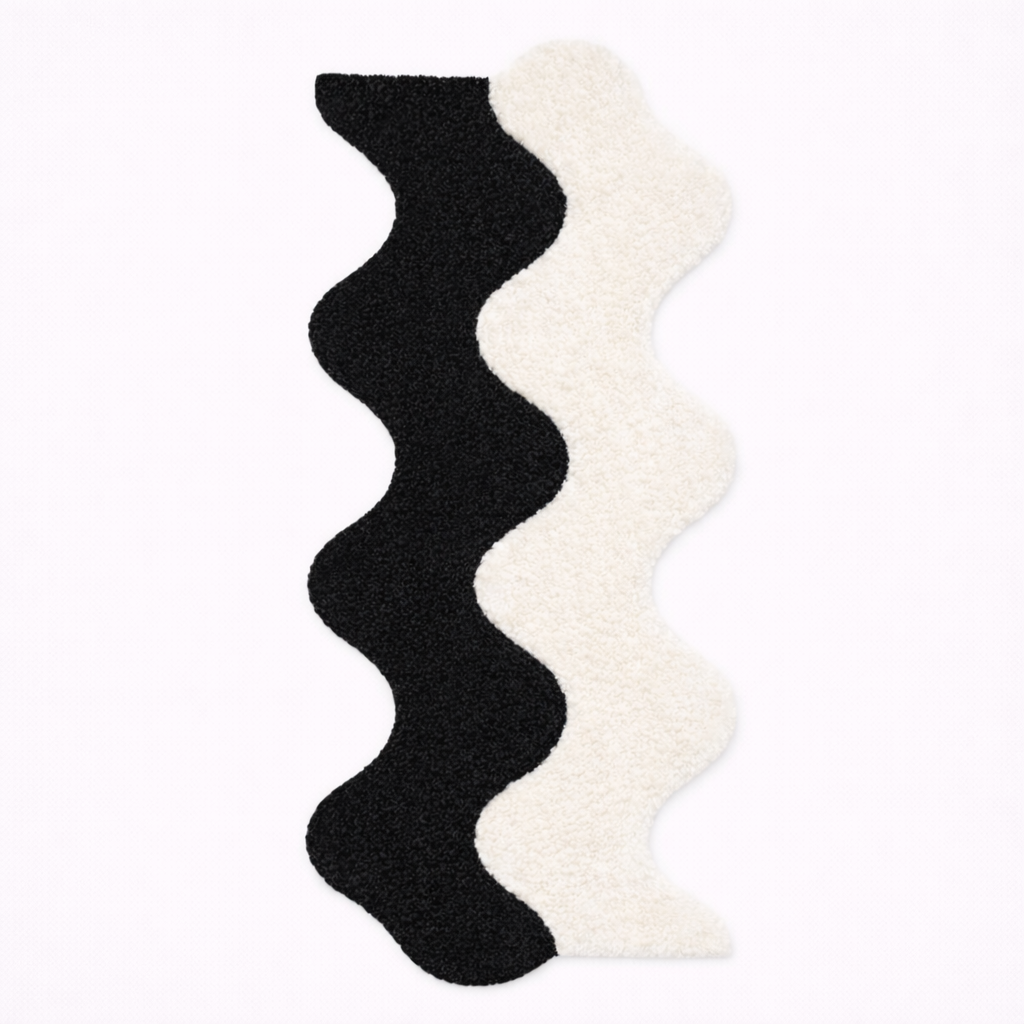 Black and white wavy rug on a white background