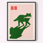 Framed artwork of a green cat on a pink background with black frame