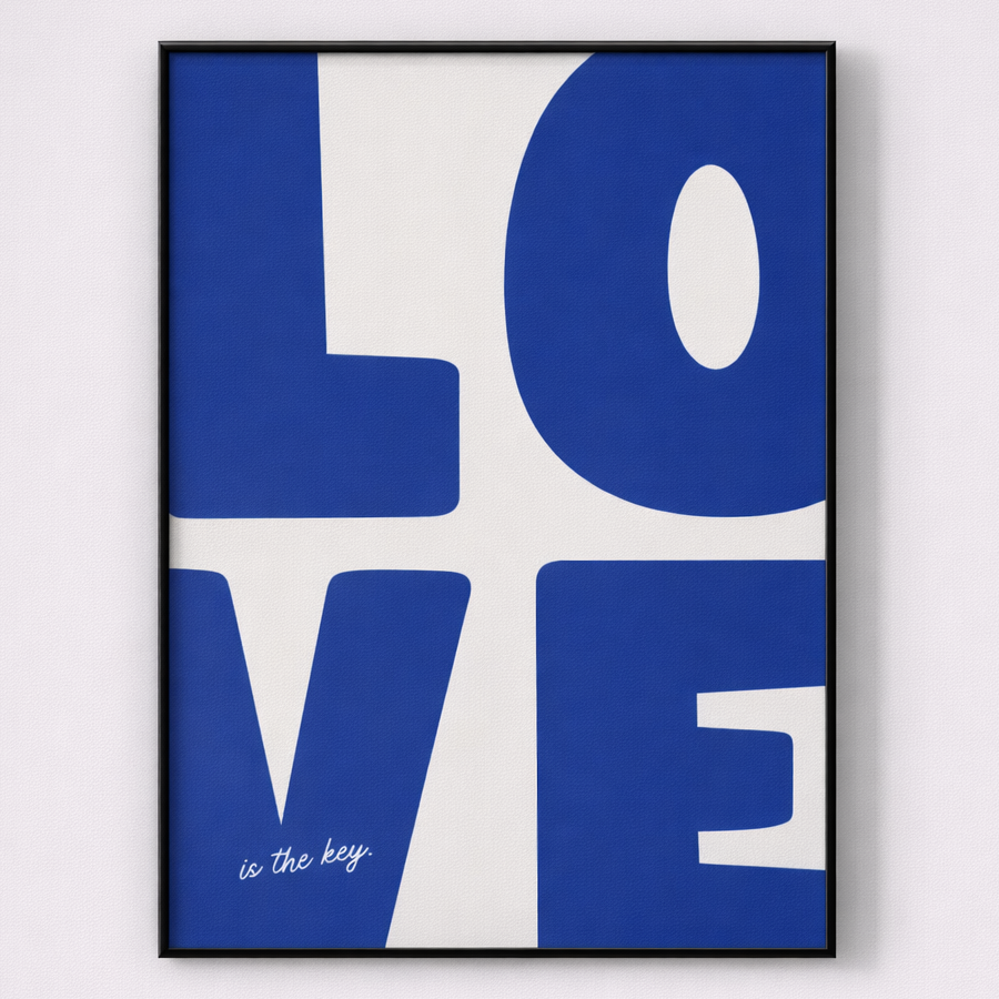 Framed artwork with 'LOVE is the key' text on a white background