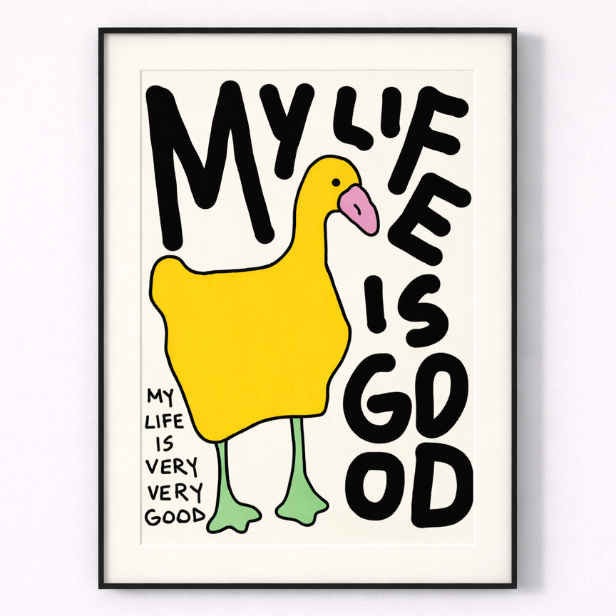 Framed poster with a yellow duck and text 'My life is good' on a white background
