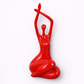 Red abstract sculpture on a white background