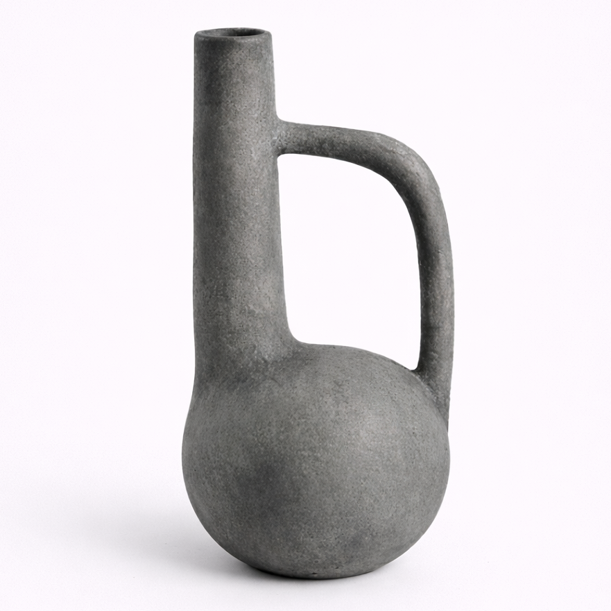 Gray ceramic pitcher on a white background