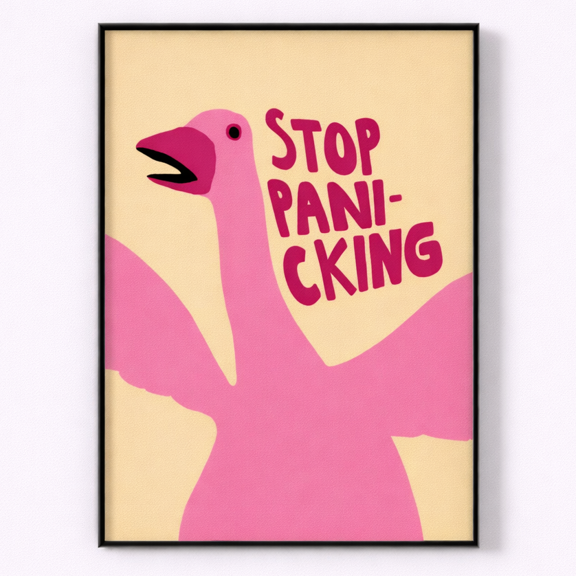 Framed artwork with a pink flamingo and text 'STOP PANIC KING' on a beige background