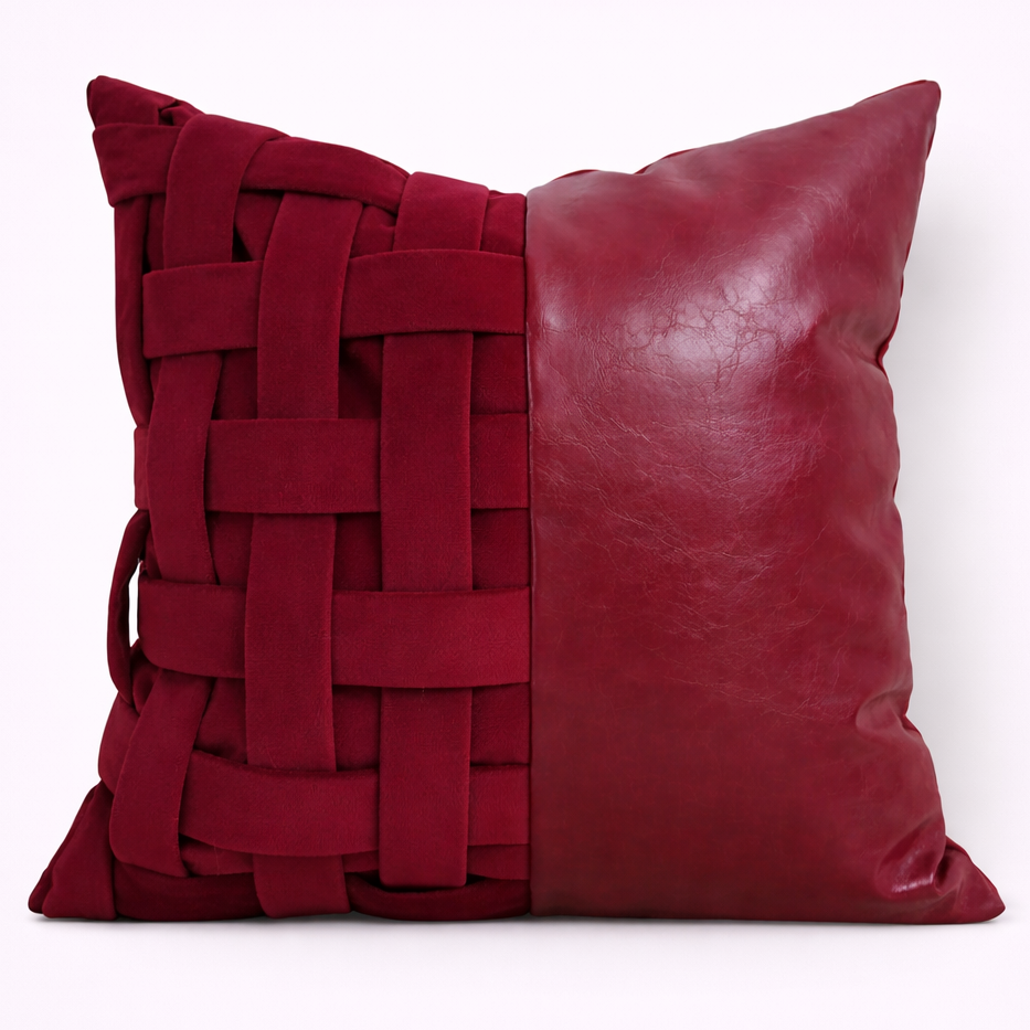 Red pillow with woven pattern on a white background