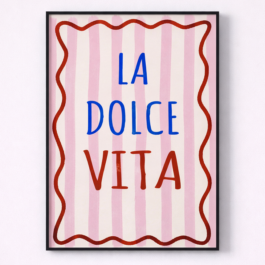 Framed artwork with 'La Dolce Vita' text on a striped background