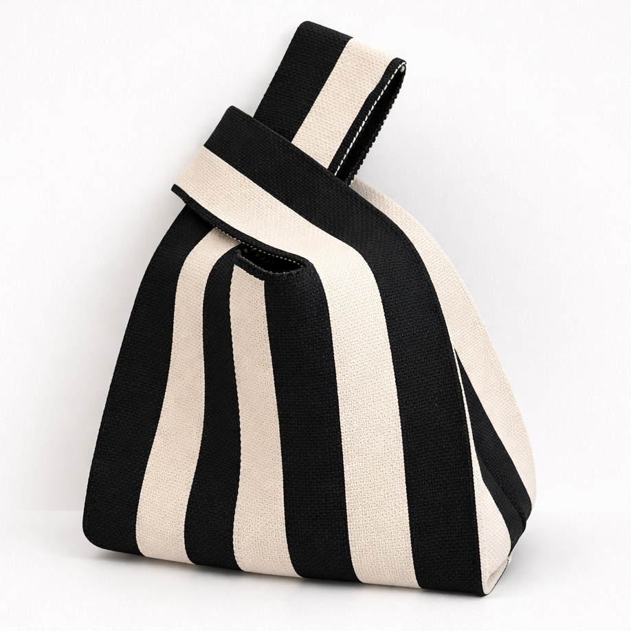 Black and white striped backpack on a white background