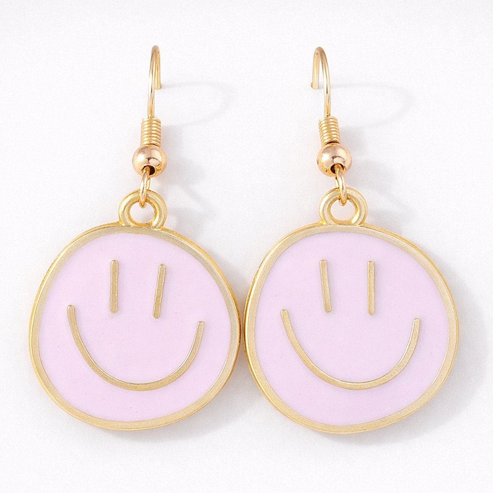 Pink smiley face earrings with gold accents on a white background