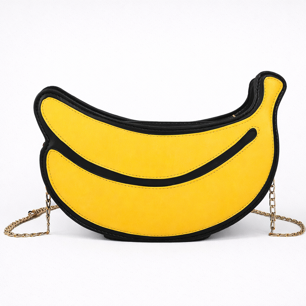 Banana-shaped handbag with a chain strap on a white background