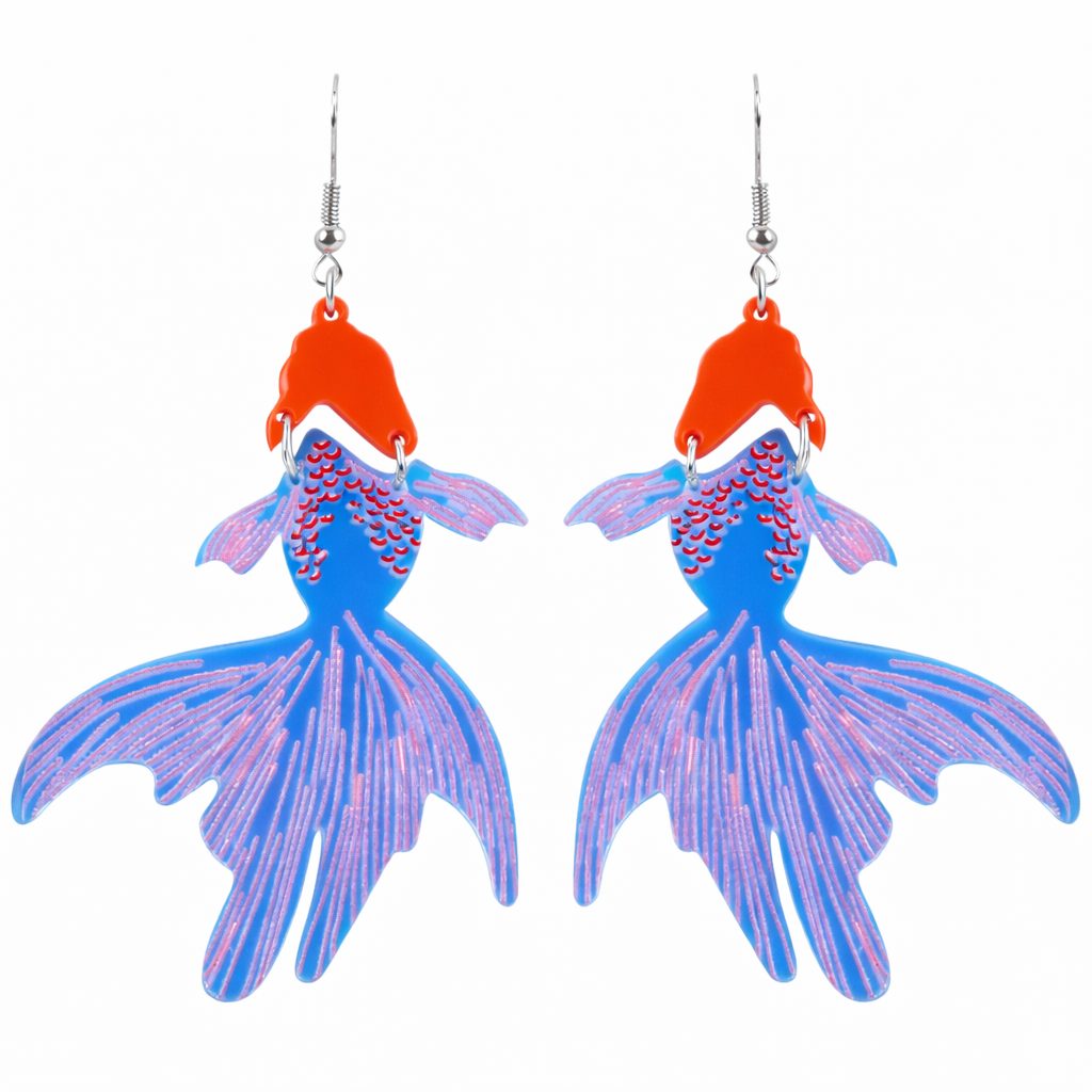 Pair of fish tail earrings with orange tops and blue tails on a white background