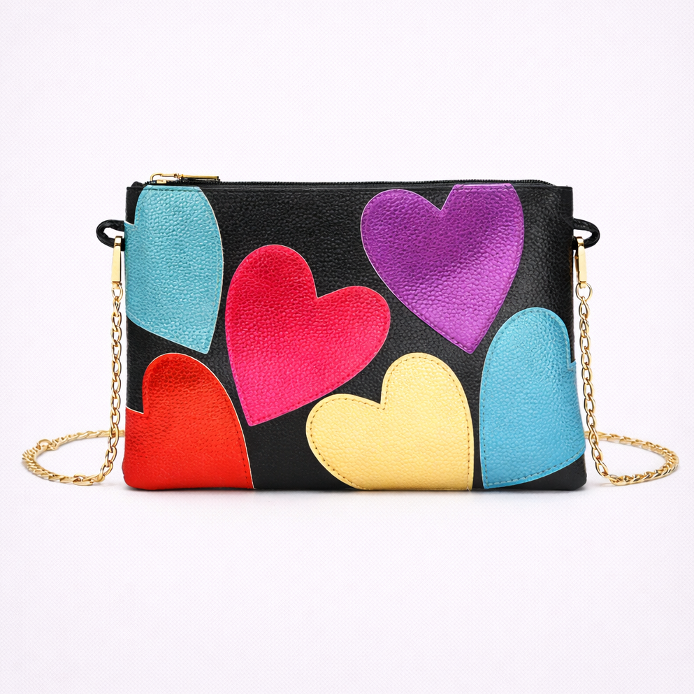 Black clutch bag with colorful heart designs on a white background