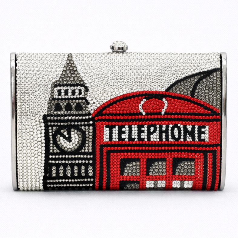 Clutch bag with London-themed design featuring Big Ben and a telephone box.