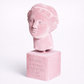 Pink bust sculpture on a white background