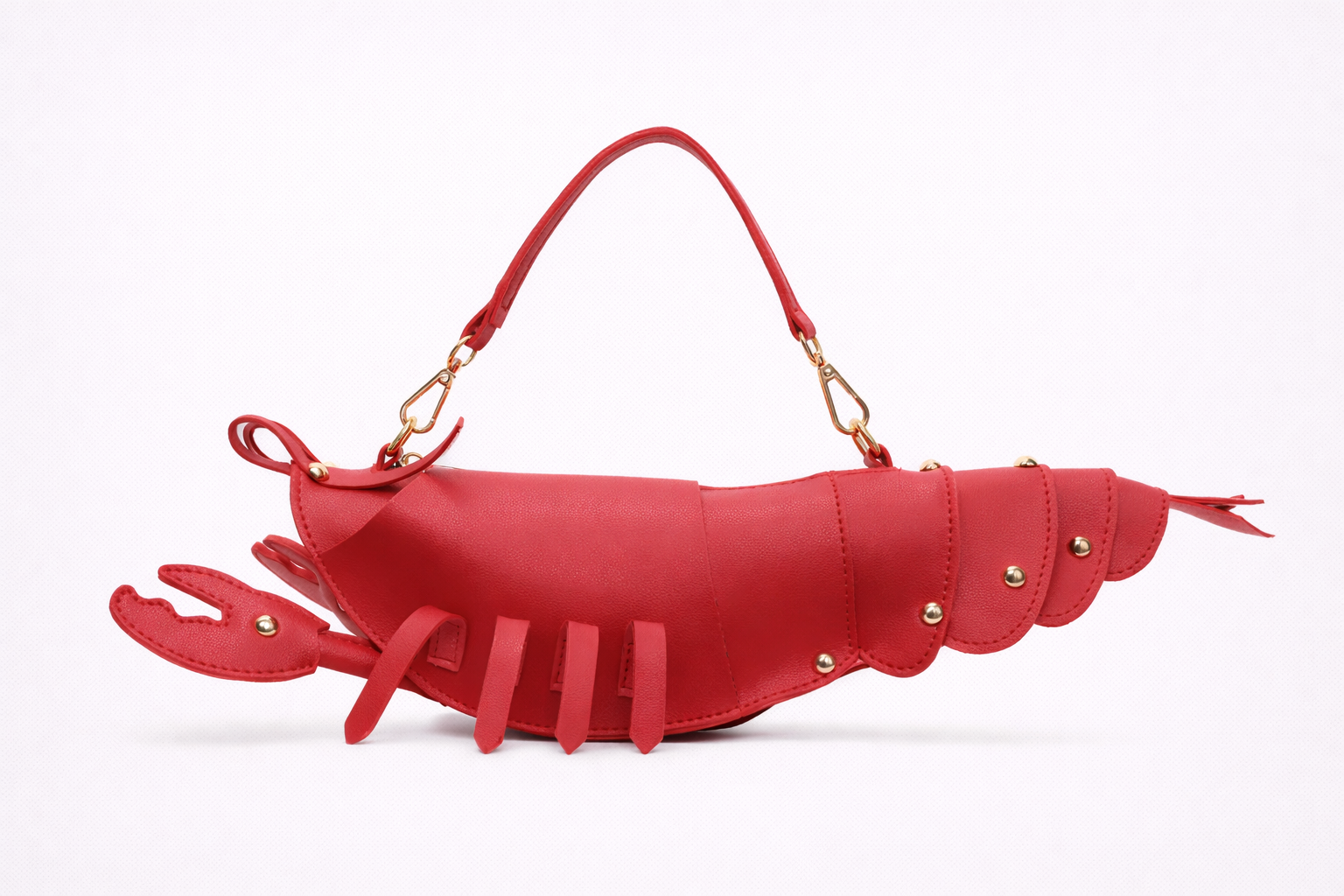 Red lobster-shaped handbag on a white background