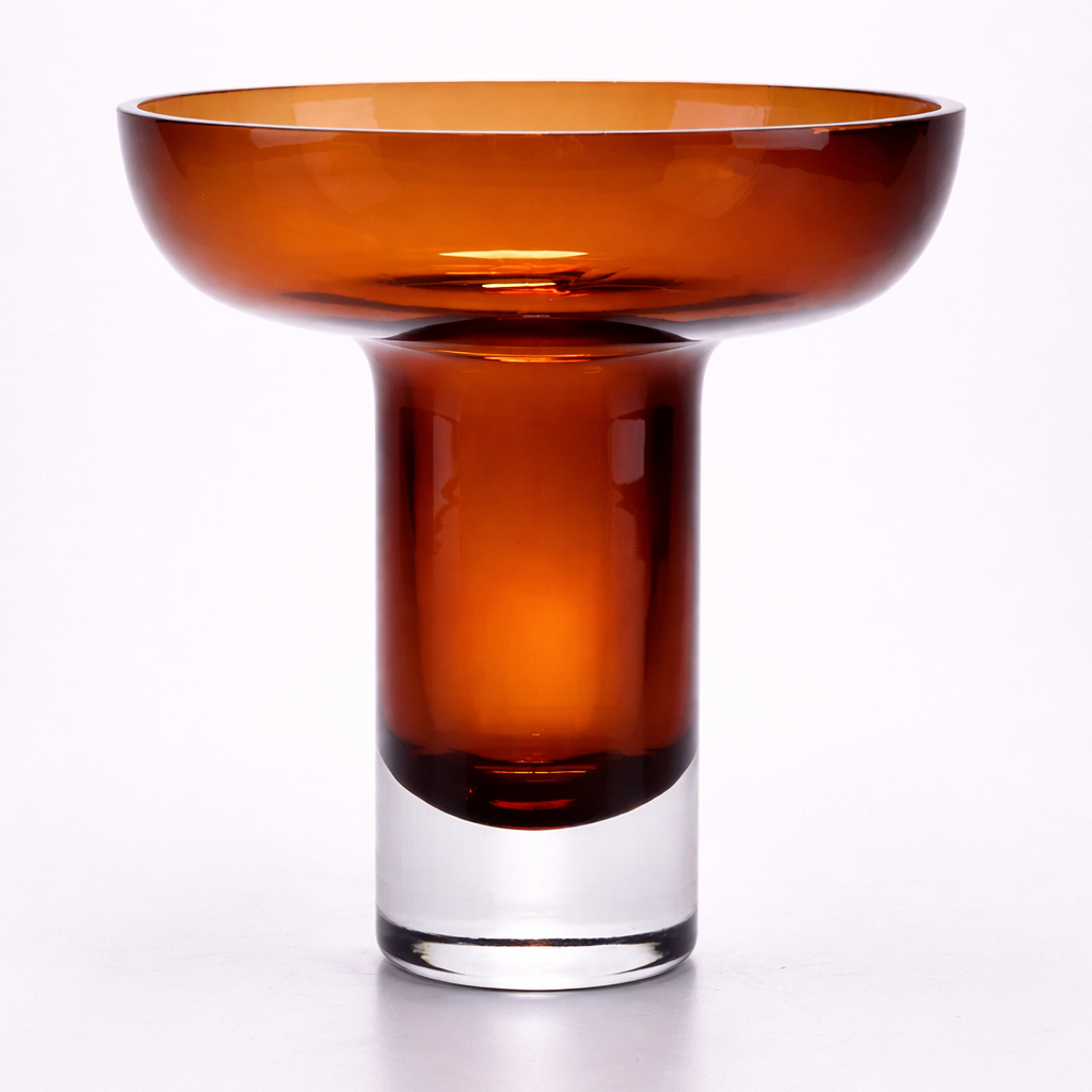 Amber glass bowl on a white background