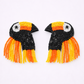 Pair of beaded toucan earrings on a white background
