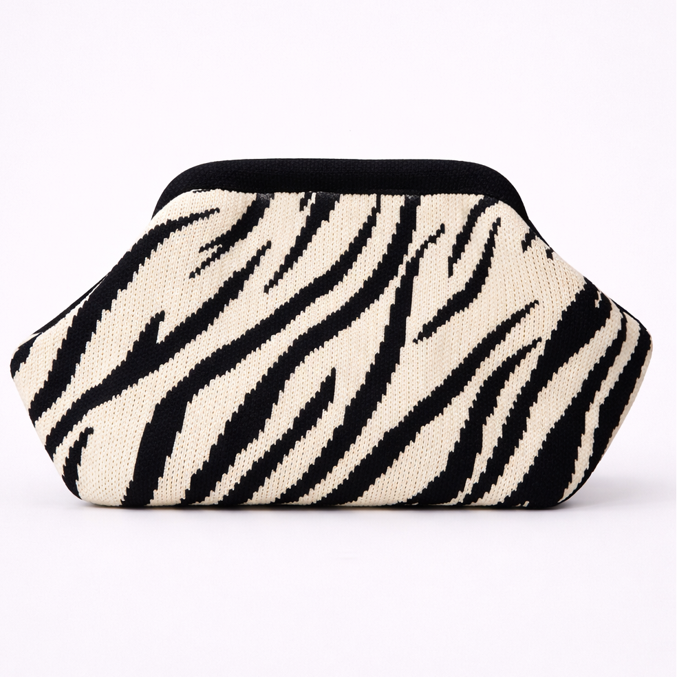 Clutch bag with zebra pattern on a white background