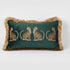 Decorative pillow with embroidered leopards and fur trim on a white background