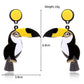 Toucan-shaped earrings with measurements on a white background